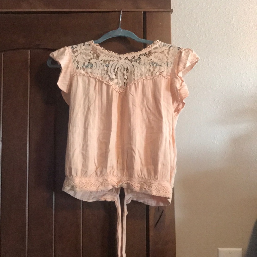 Peach blouse top